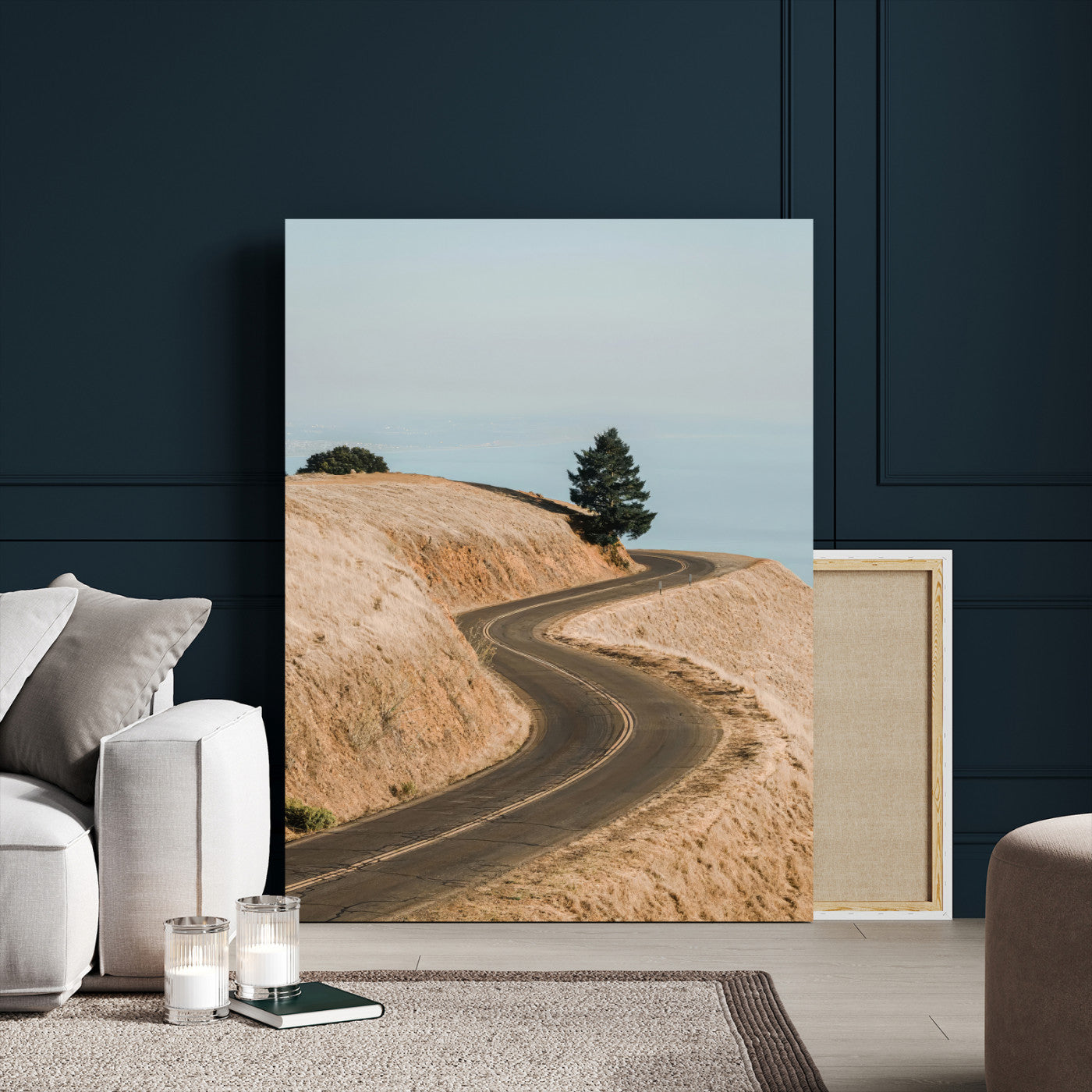 Earth-toned photograph of a winding road through golden hills, ideal for neutral or rustic-themed decor with a calming travel vibe.