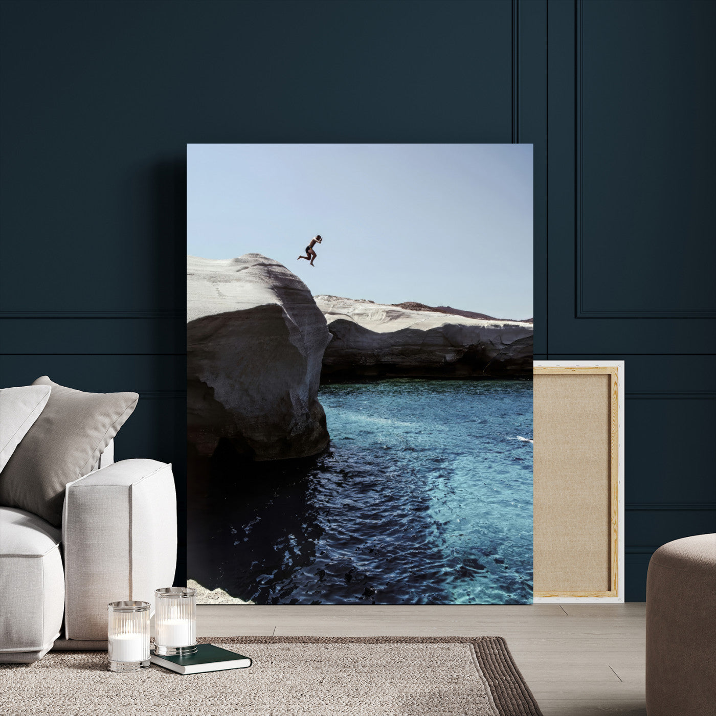Canvas of a cliff diver above turquoise waters and rocky coastline under clear sky, ideal for adventurous minimalist or coastal home decor.