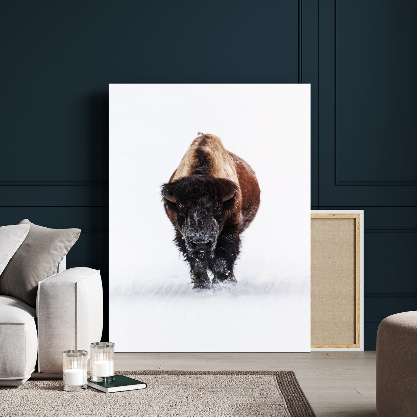 Front view of a strong bison walking in deep snow, isolated white background, perfect for rustic or lodge-style home decor.