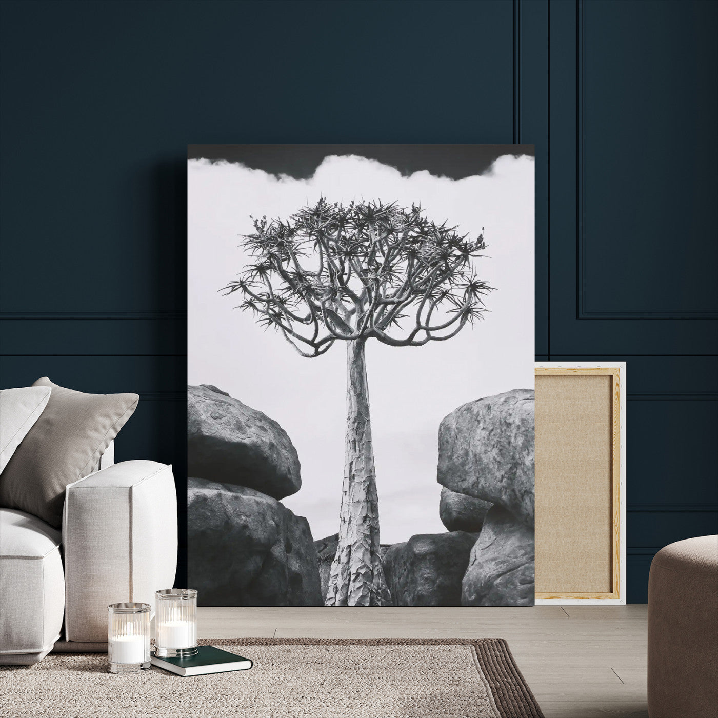 Tall desert tree in black and white, standing between large rocks, perfect for bold and minimalist nature-themed interior spaces.