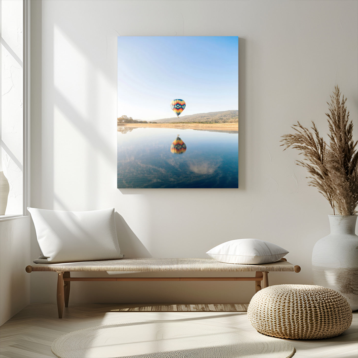 Canvas of a hot air balloon floating above a calm lake with soft reflections and vibrant sky, ideal for modern minimalist or adventure-themed home decor.