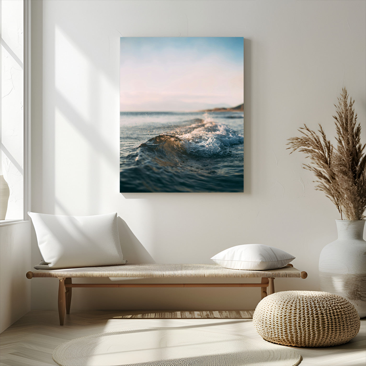 Close-up of ocean waves rolling gently toward the shore at sunset, creating a peaceful and minimalist coastal scene.