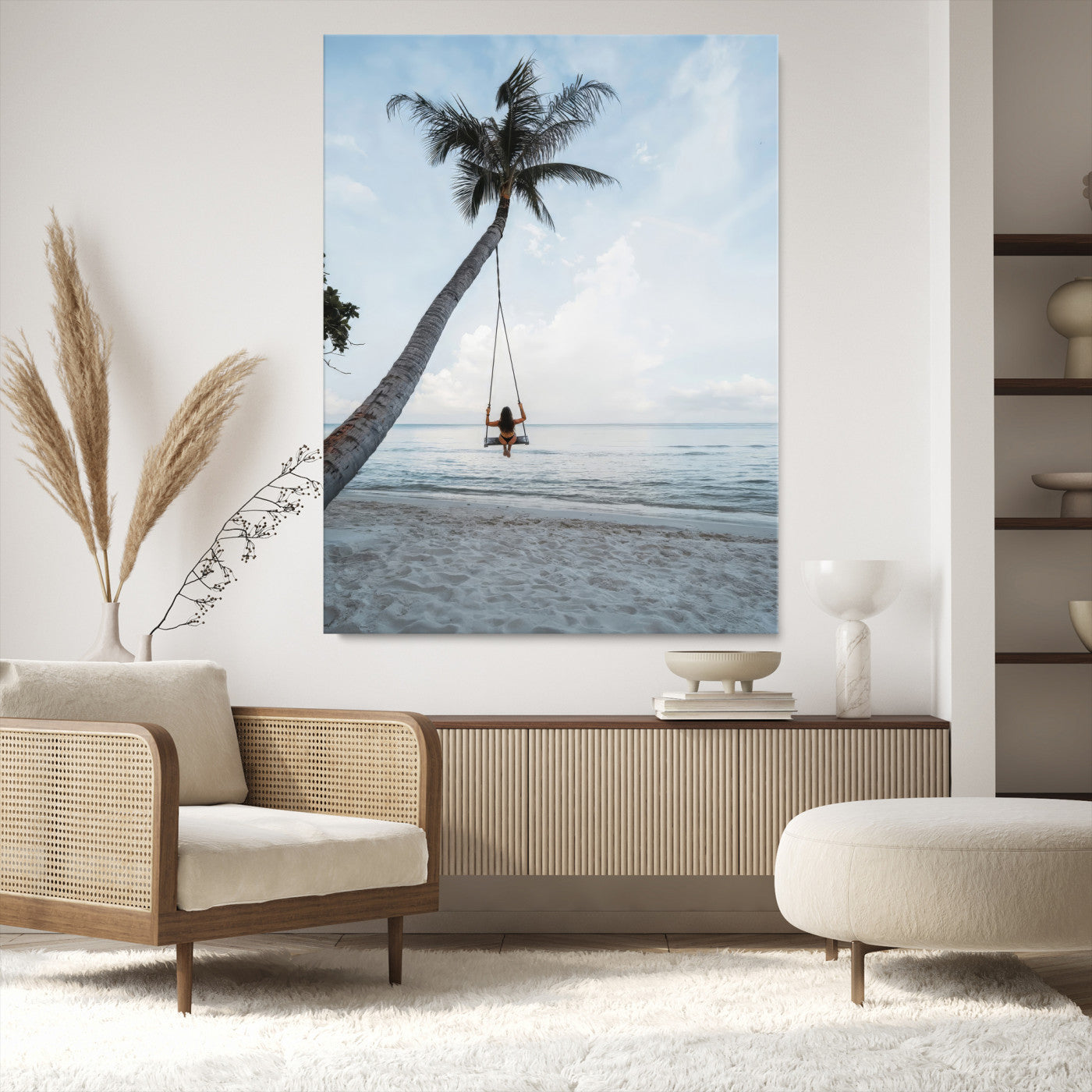 Wall art of a girl on a swing hanging from a palm tree over calm ocean waters, perfect for tropical or minimalist coastal decor.