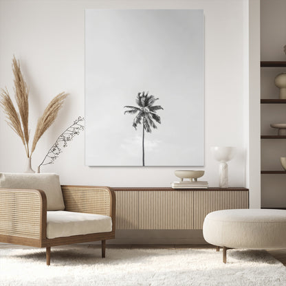 Canvas of a single palm tree in black and white with minimalist sky, ideal for modern coastal minimalist or tropical-inspired home decor.