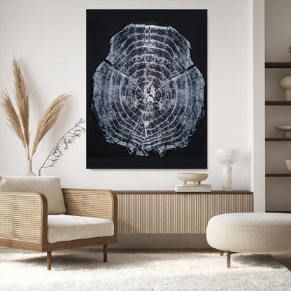 Monochrome tree ring cross-section on black background, showing detailed growth lines, perfect for modern rustic or minimalist interiors. (