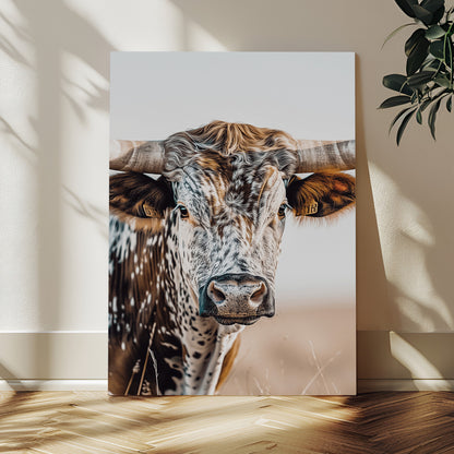 Canvas of a speckled Texas longhorn with wide curved horns and warm tones, perfect for rustic or country-style wall decor.
