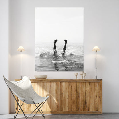 Black and white ocean art featuring a swimmer's legs mid-splash, perfect for minimalist, coastal, or monochrome modern interiors.