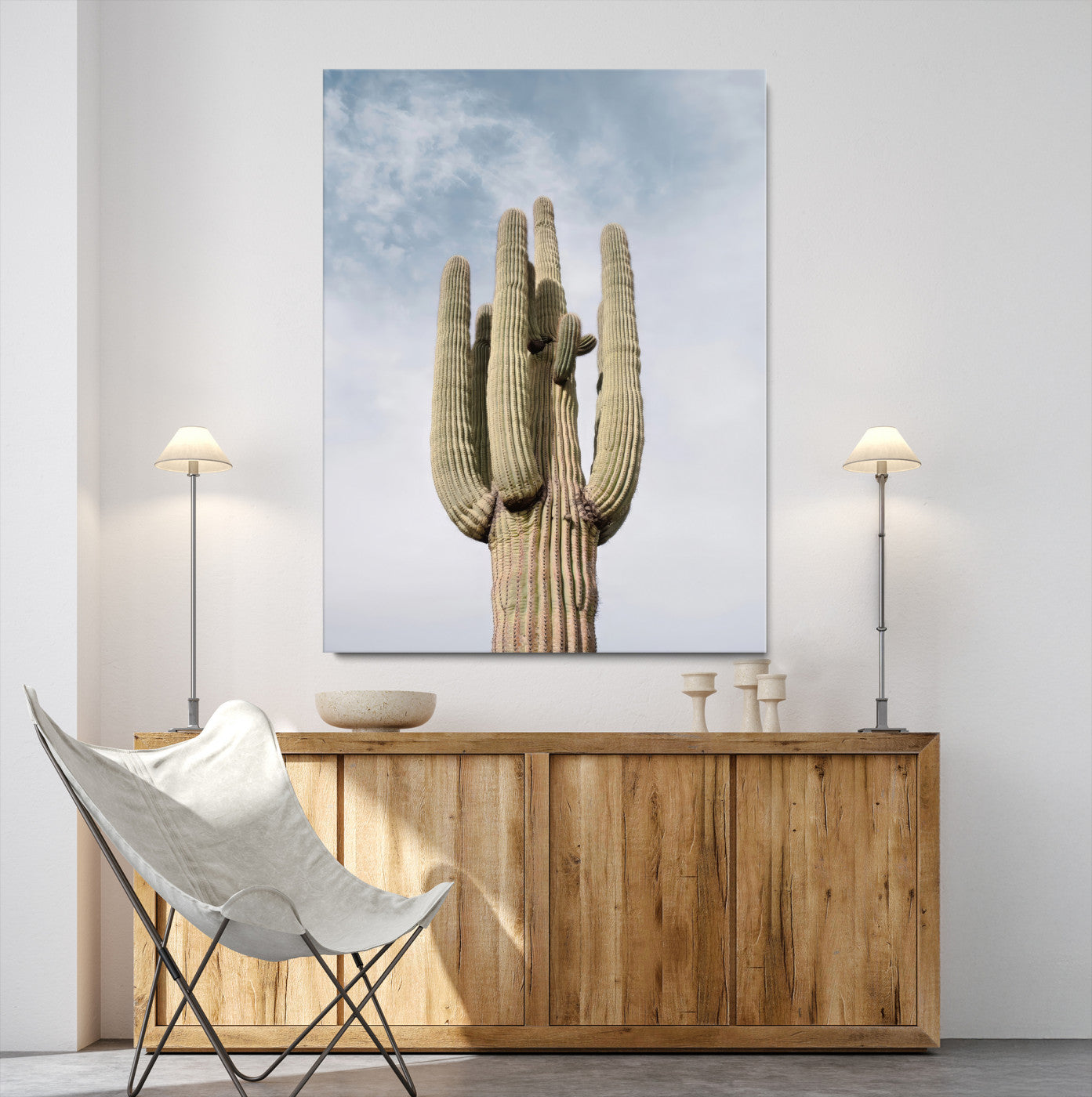 Vertical photo of a tall saguaro cactus against a soft sky, ideal for earthy or Southwestern home decor with warm neutral tones.