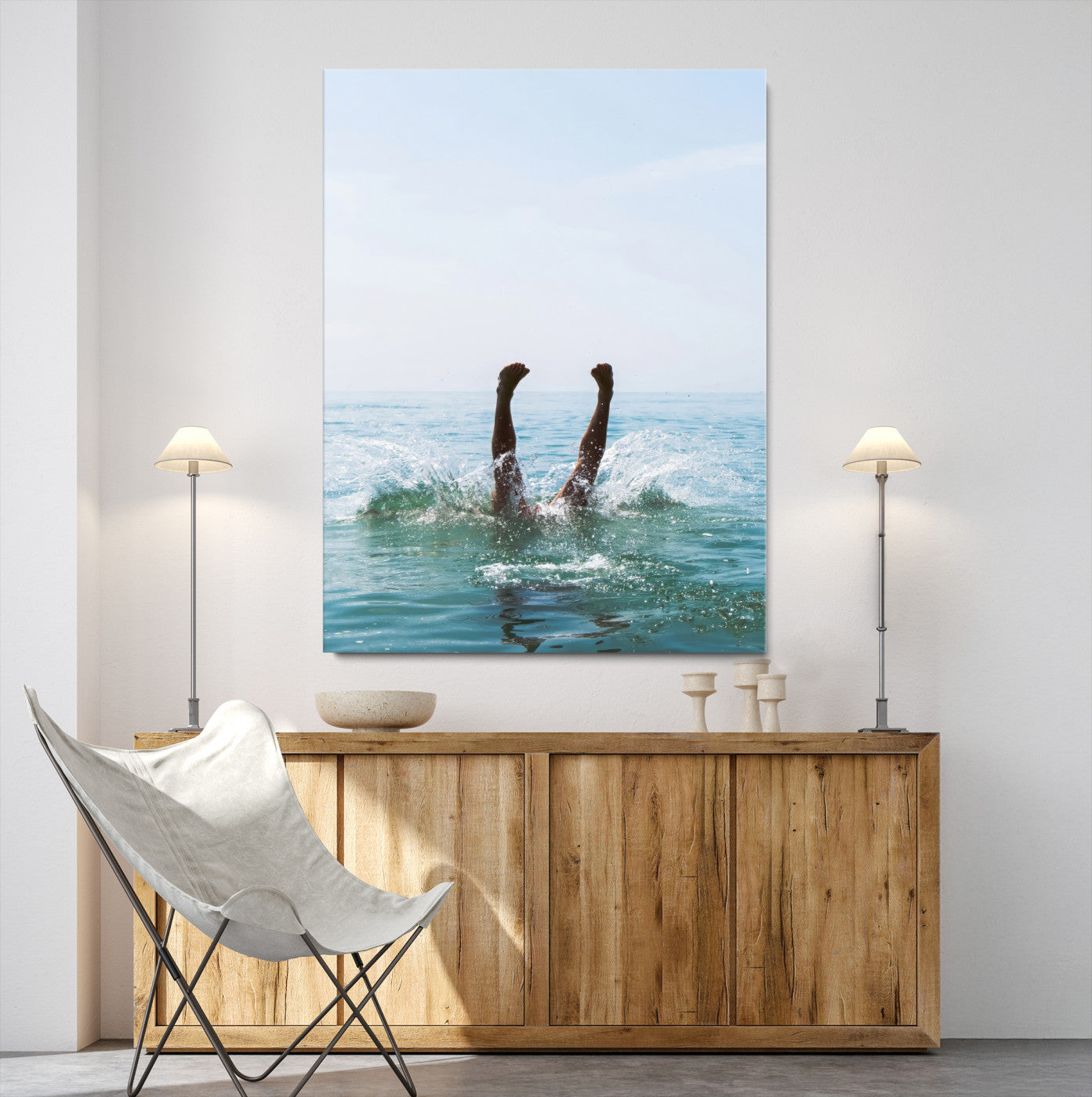 Vibrant ocean canvas of a playful diving splash, ideal for coastal or beach-themed interiors with a lively summer vibe.