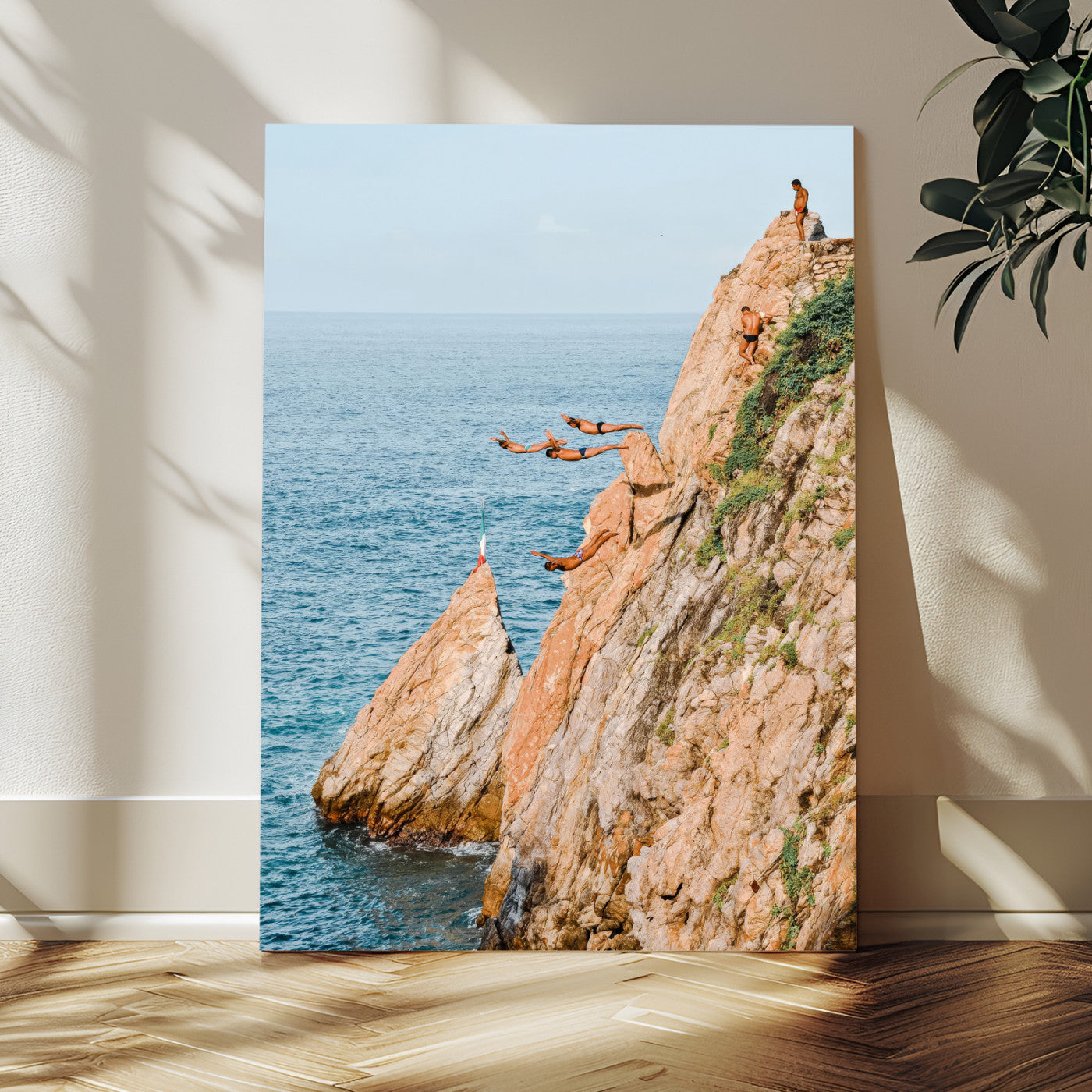 Canvas wall art capturing a bold cliff diving sequence into turquoise waters, perfect for vibrant and adventurous coastal or sporty interiors.
