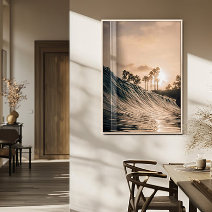 Golden sunset view of an ocean wave curling near palm trees, radiating warm tones perfect for coastal or tropical-themed decor.