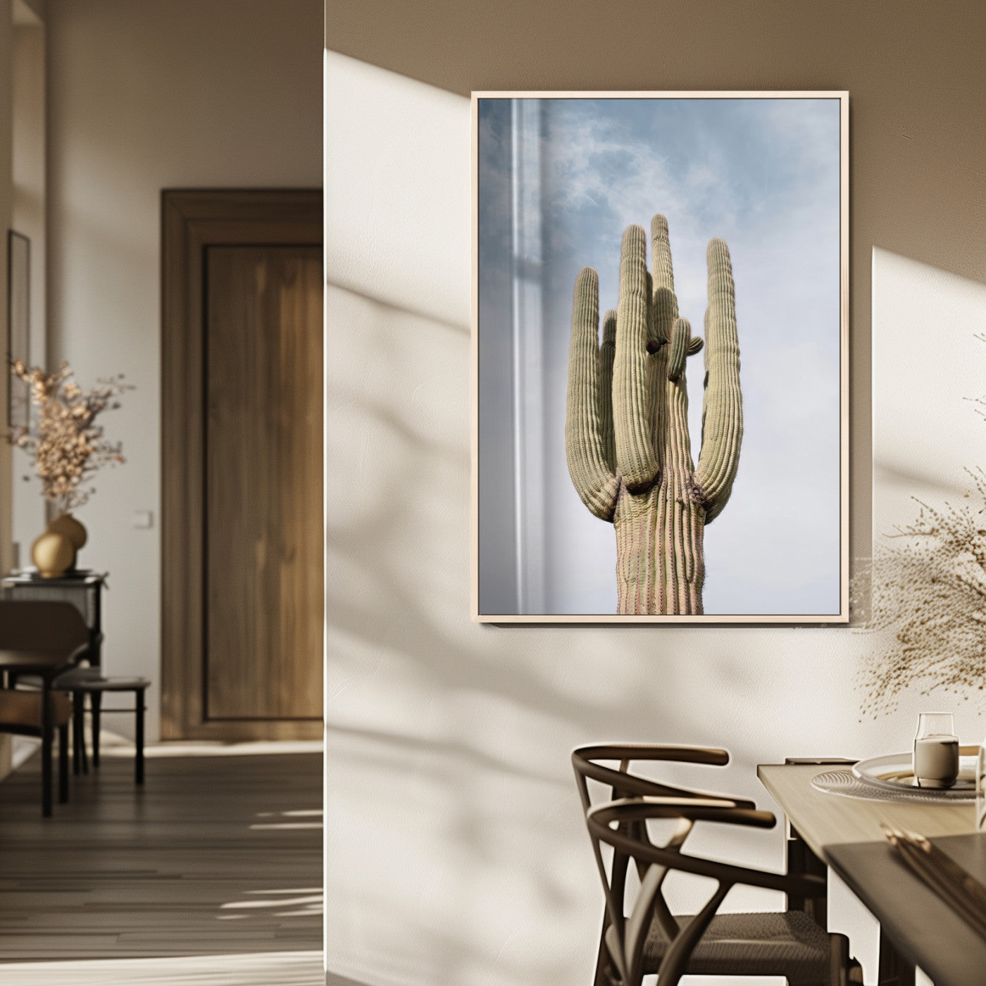 Vertical photo of a tall saguaro cactus against a soft sky, ideal for earthy or Southwestern home decor with warm neutral tones.