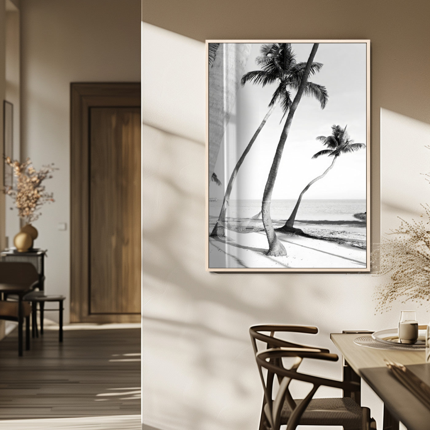 Black and white wall art of palm trees and a hammock on a beach, ideal for coastal minimalist or tropical-themed decor.
