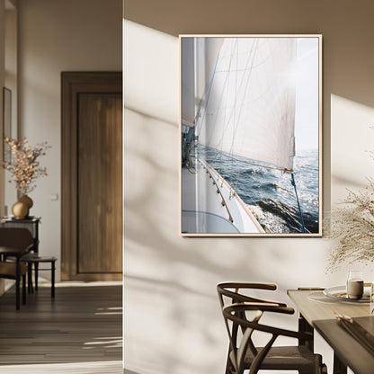 Canvas of a sailboat gliding on a sunlit ocean with white sails and sparkling water, ideal for coastal minimalist or nautical-style home decor.