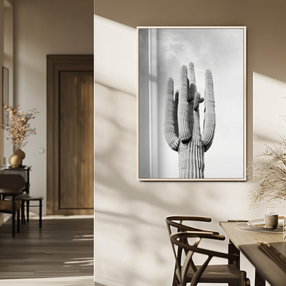 Canvas of a tall saguaro cactus in black and white with moody tones, perfect for southwestern minimalist or modern desert-themed home decor.