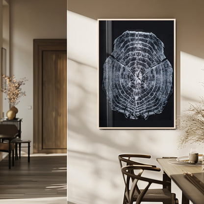 Monochrome tree ring cross-section on black background, showing detailed growth lines, perfect for modern rustic or minimalist interiors. (