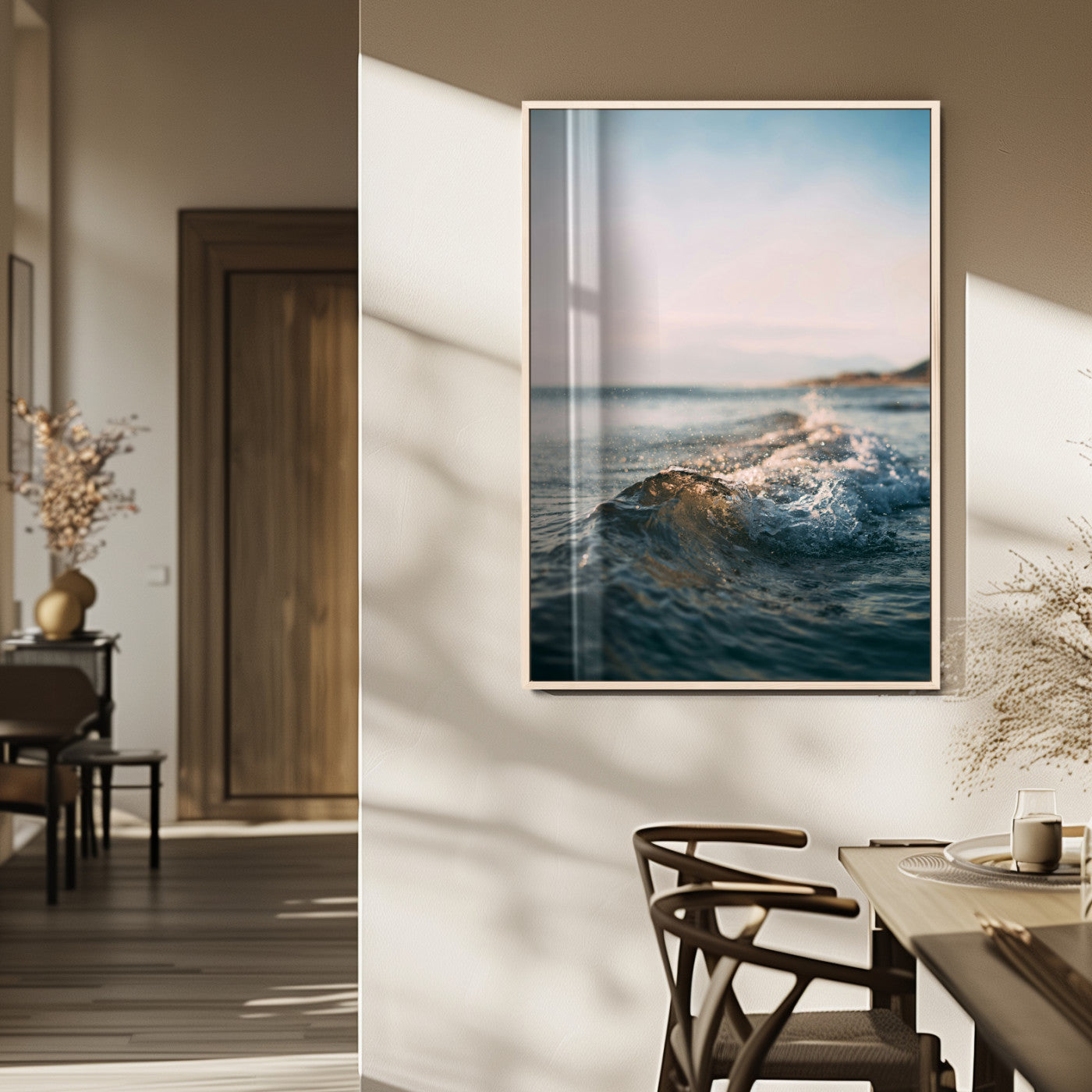 Close-up of ocean waves rolling gently toward the shore at sunset, creating a peaceful and minimalist coastal scene.