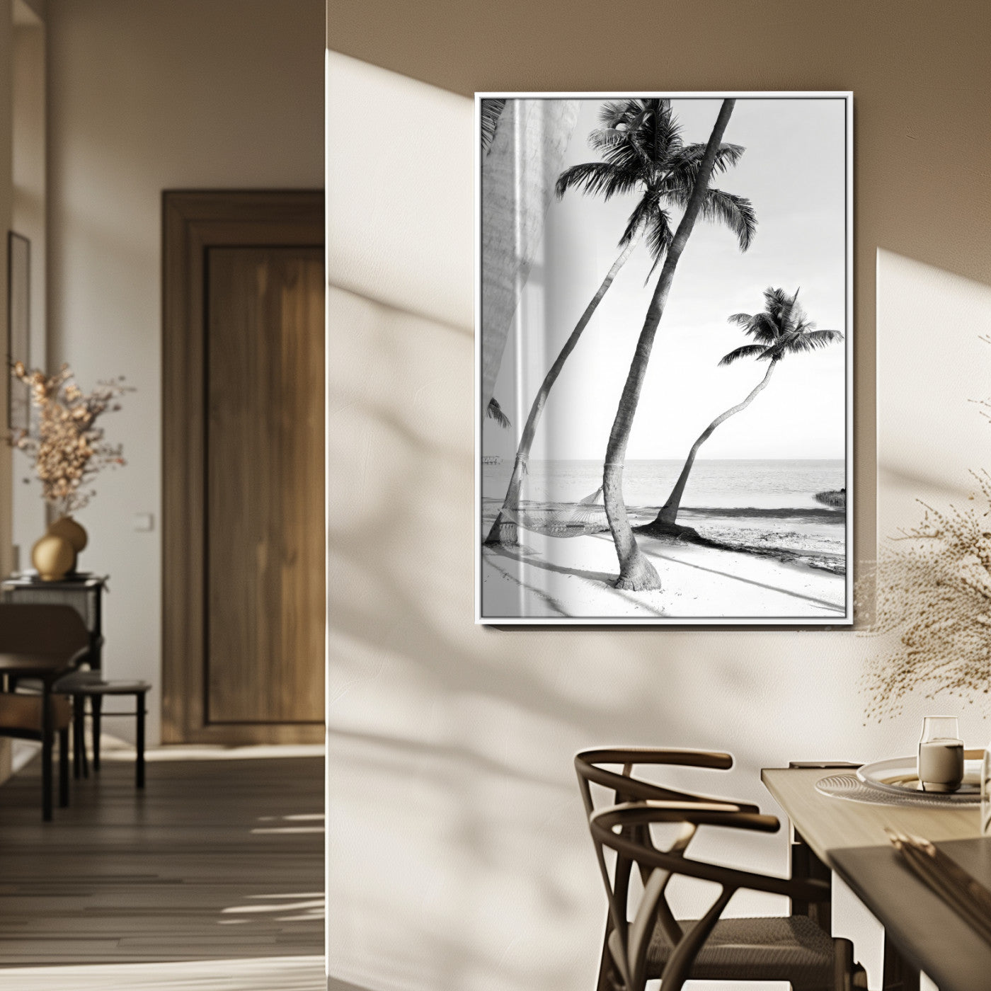 Black and white wall art of palm trees and a hammock on a beach, ideal for coastal minimalist or tropical-themed decor.