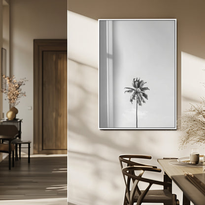 Canvas of a single palm tree in black and white with minimalist sky, ideal for modern coastal minimalist or tropical-inspired home decor.