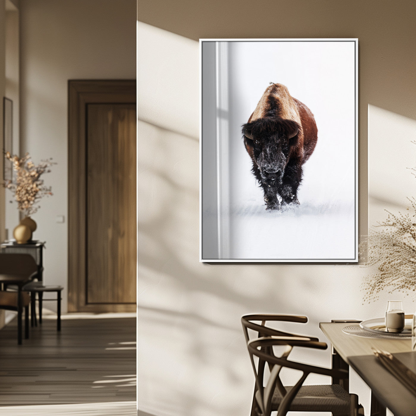 Front view of a strong bison walking in deep snow, isolated white background, perfect for rustic or lodge-style home decor.
