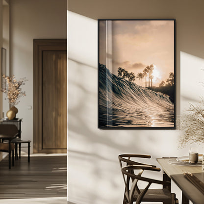 Golden sunset view of an ocean wave curling near palm trees, radiating warm tones perfect for coastal or tropical-themed decor.