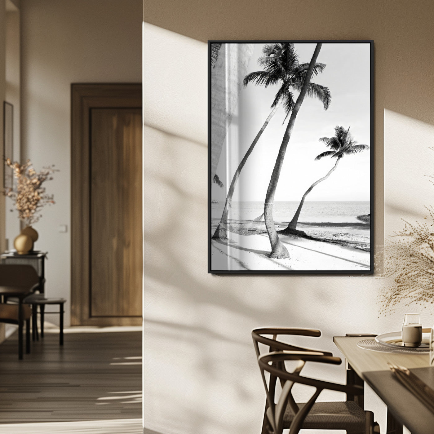 Black and white wall art of palm trees and a hammock on a beach, ideal for coastal minimalist or tropical-themed decor.