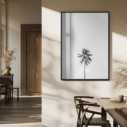 Canvas of a single palm tree in black and white with minimalist sky, ideal for modern coastal minimalist or tropical-inspired home decor.