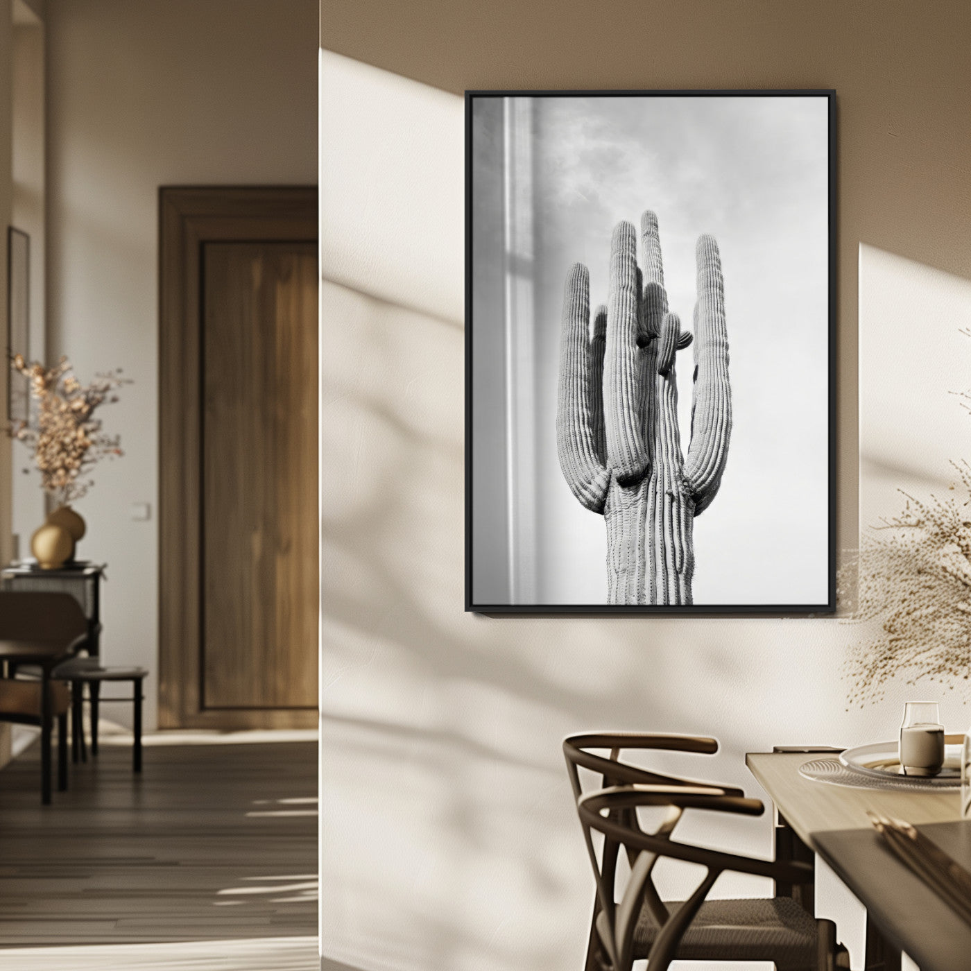 Canvas of a tall saguaro cactus in black and white with moody tones, perfect for southwestern minimalist or modern desert-themed home decor.