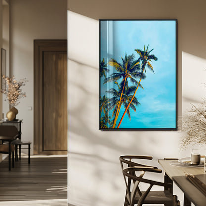 "Tall palm trees with golden sunlight against a vibrant blue sky, creating a tropical, relaxing atmosphere for coastal and beach-themed decor.