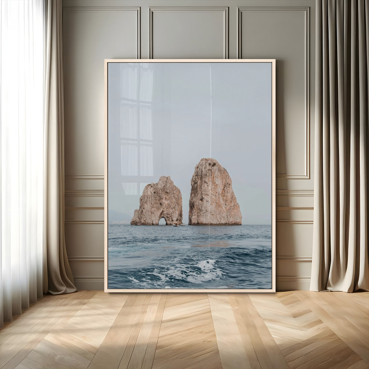 Serene photograph of the Faraglioni rocks in Capri with calm blue waters, perfect for Mediterranean coastal or minimalist travel-themed decor.