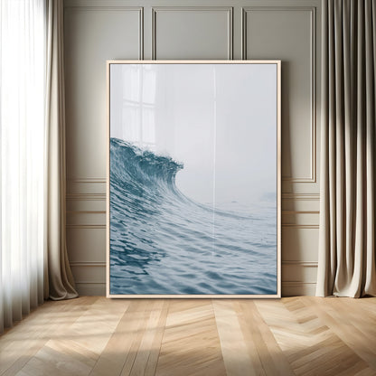 A single ocean wave curling in soft blue tones under a misty sky, ideal for coastal or minimalist home wall decor.