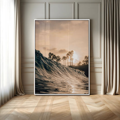 Golden sunset view of an ocean wave curling near palm trees, radiating warm tones perfect for coastal or tropical-themed decor.