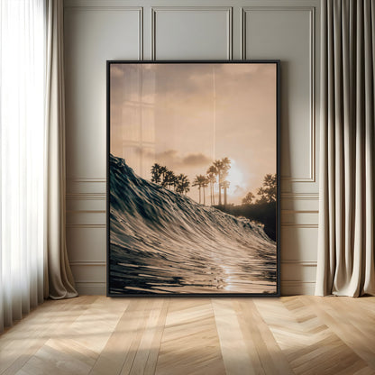 Golden sunset view of an ocean wave curling near palm trees, radiating warm tones perfect for coastal or tropical-themed decor.