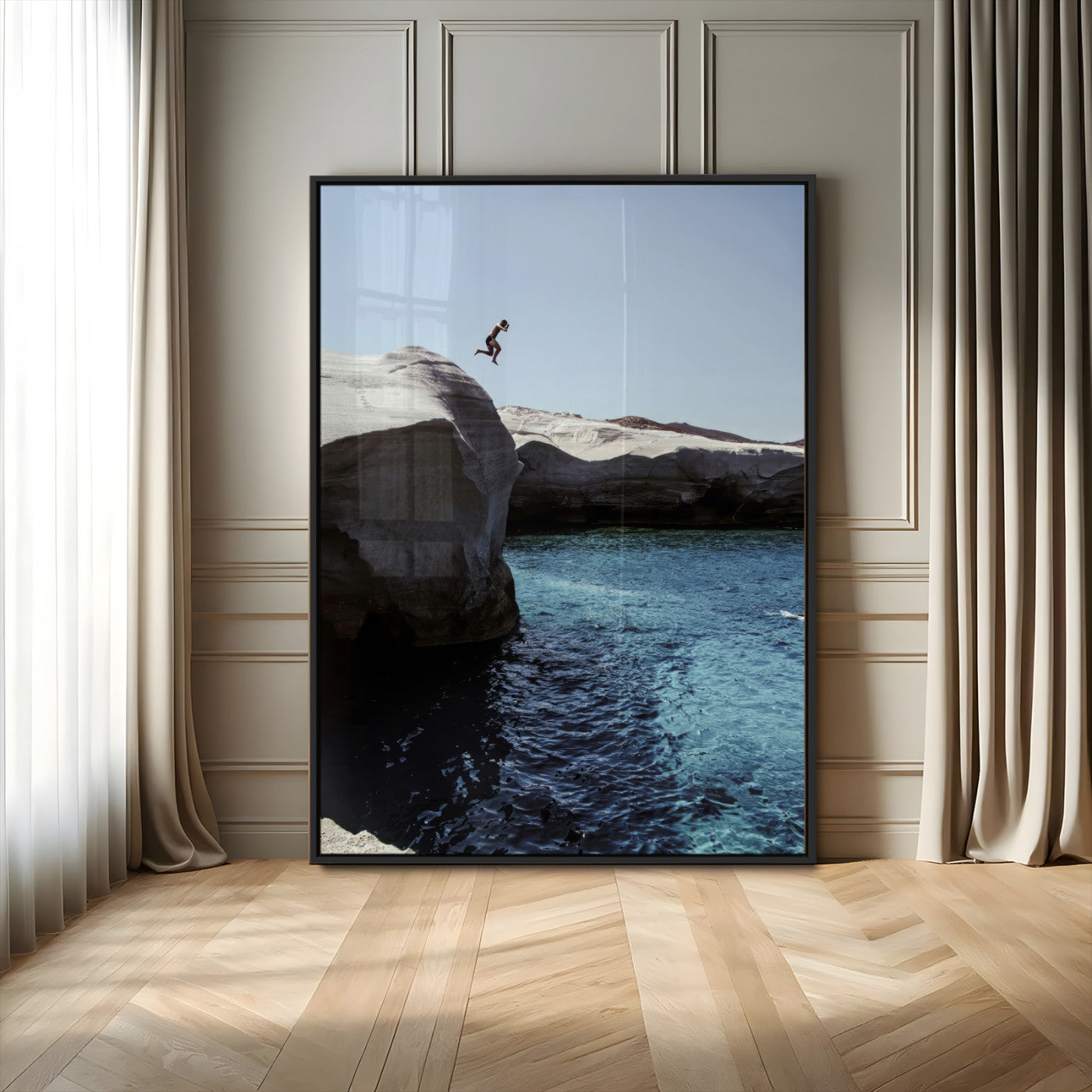 Canvas of a cliff diver above turquoise waters and rocky coastline under clear sky, ideal for adventurous minimalist or coastal home decor.