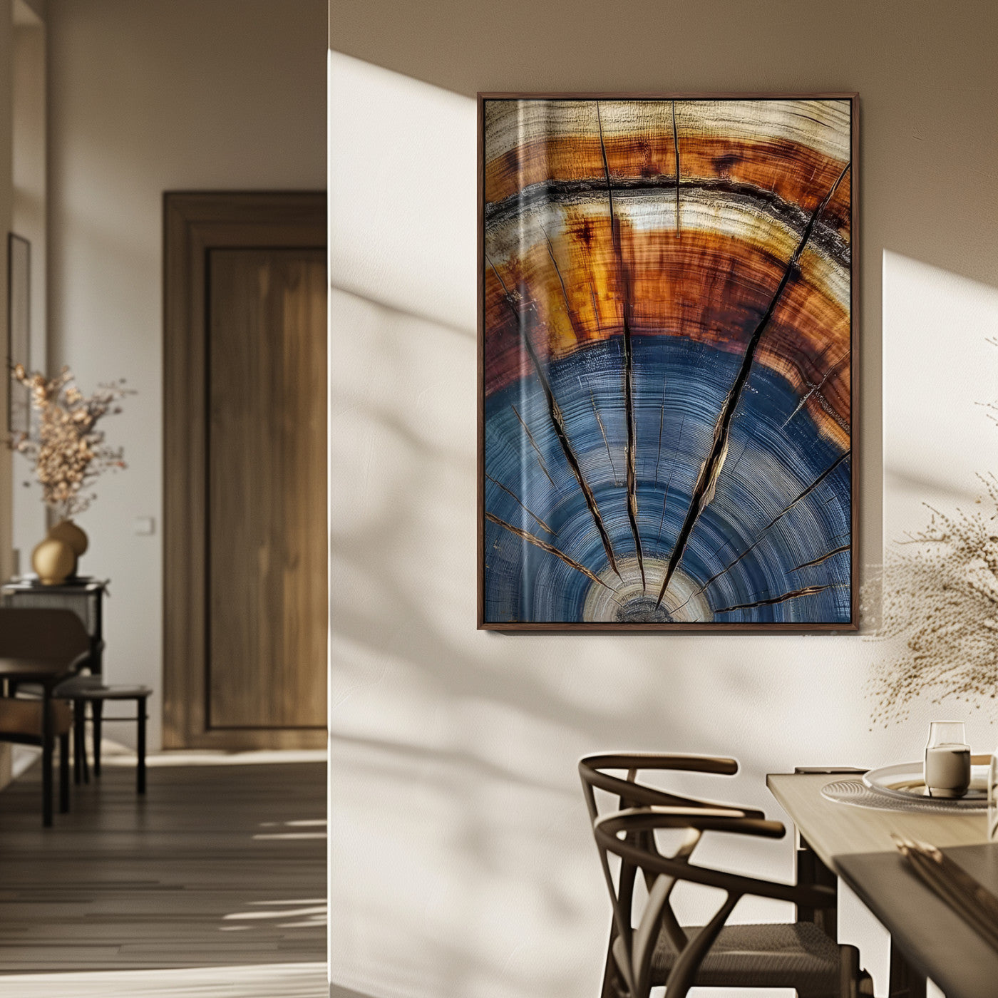 Canvas of a tree ring with bold blue and orange hues and cracked radial lines, ideal for rustic or earthy modern interiors.