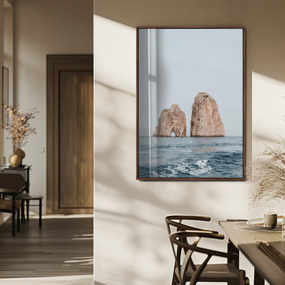 Serene photograph of the Faraglioni rocks in Capri with calm blue waters, perfect for Mediterranean coastal or minimalist travel-themed decor.