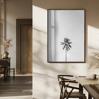 Canvas of a single palm tree in black and white with minimalist sky, ideal for modern coastal minimalist or tropical-inspired home decor.