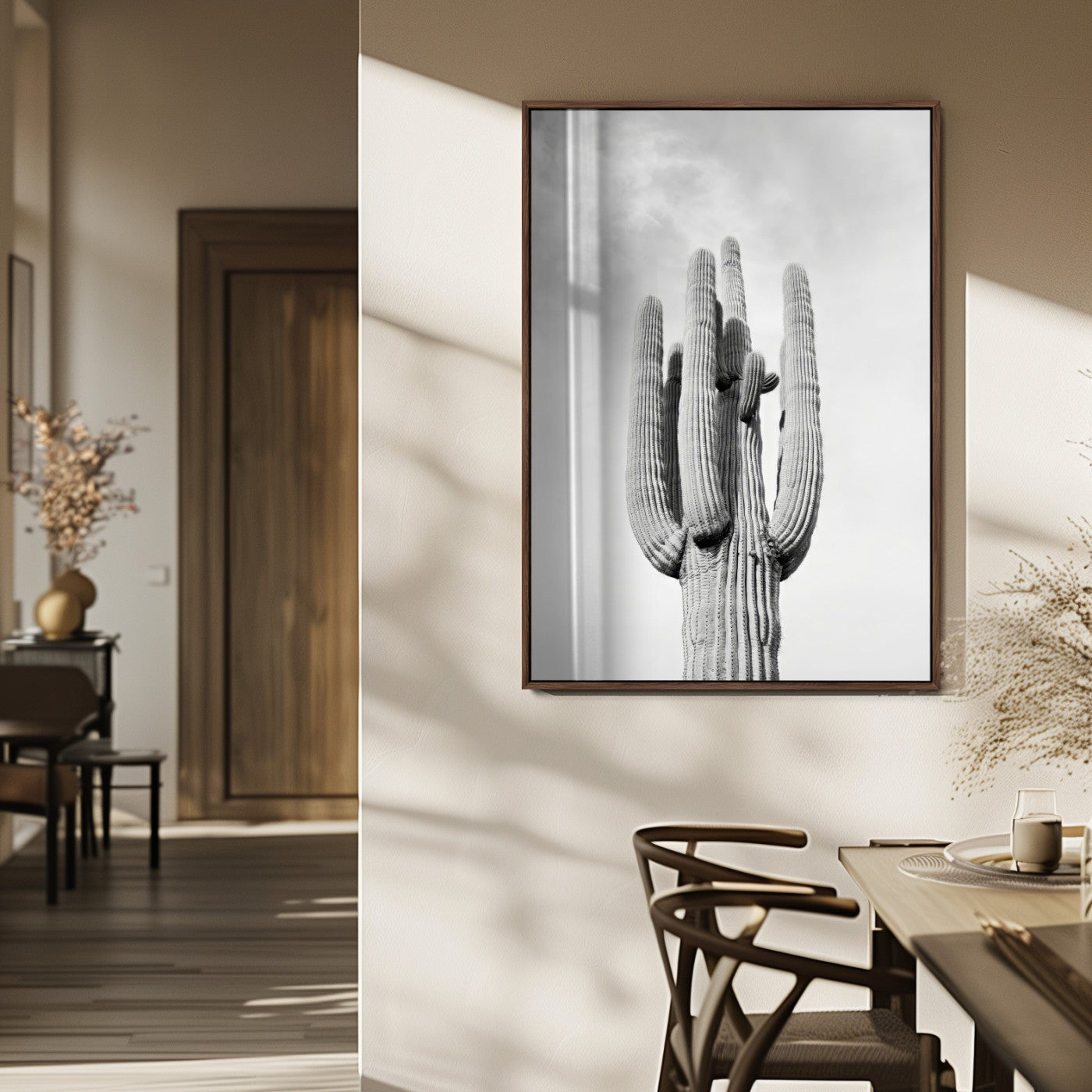 Canvas of a tall saguaro cactus in black and white with moody tones, perfect for southwestern minimalist or modern desert-themed home decor.
