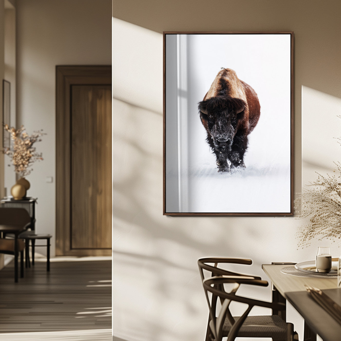 Front view of a strong bison walking in deep snow, isolated white background, perfect for rustic or lodge-style home decor.