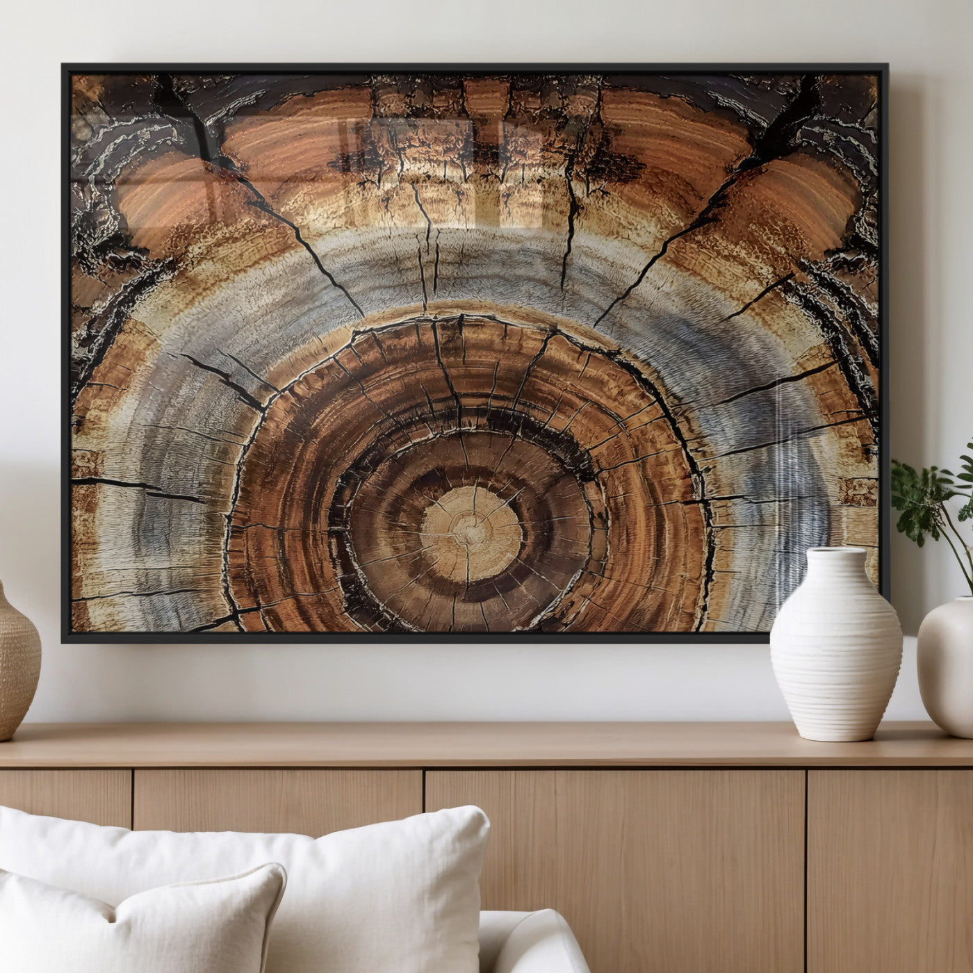 Canvas of tree rings and natural wood grain in earthy tones, ideal for rustic or vintage-inspired home decor with organic textures.