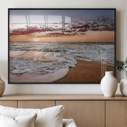 Canvas of a sunset over a foamy ocean shore with warm light and gentle waves, ideal for coastal or beach-themed home decor.