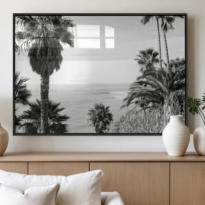 Monochrome canvas of palm trees framing a coastal surf scene, perfect for California-inspired or retro black-and-white beach decor.