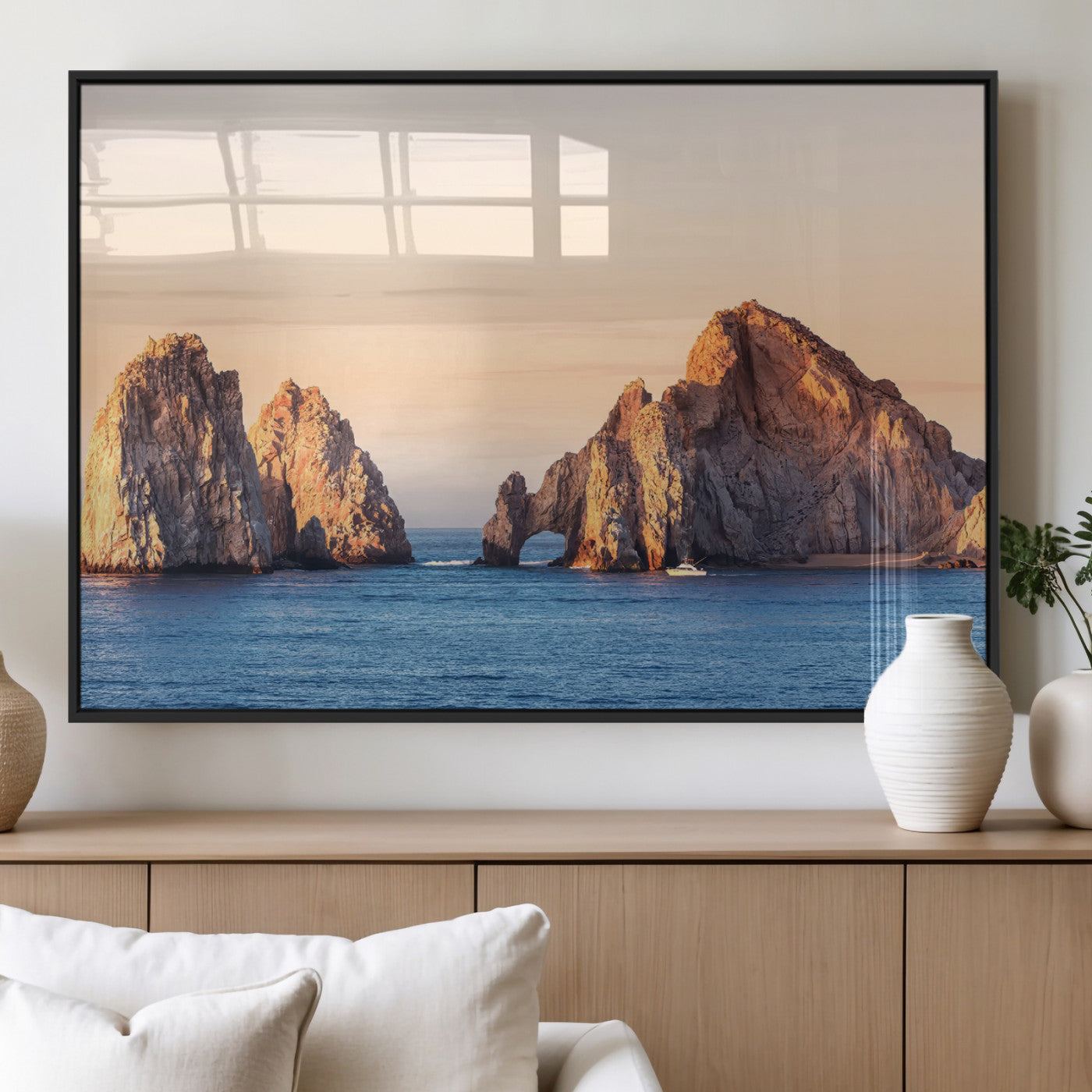 Framed canvas of El Arco rock formation in Cabo San Lucas at golden hour, ideal for coastal landmark or ocean-inspired decor.