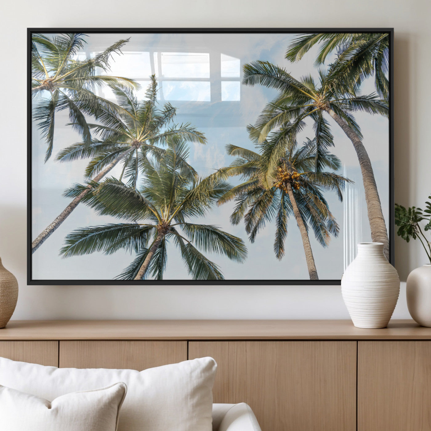 Framed canvas of tall palm trees reaching into a tropical sky, ideal for beach home or relaxed island-inspired wall decor.