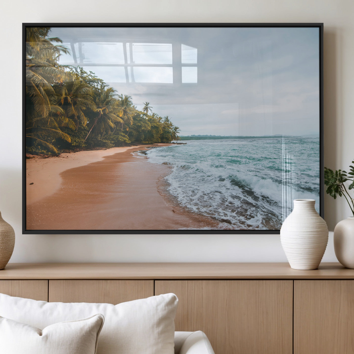 Framed canvas of a tropical beach with palm trees and soft waves, ideal for coastal escape or serene nature-inspired home decor.