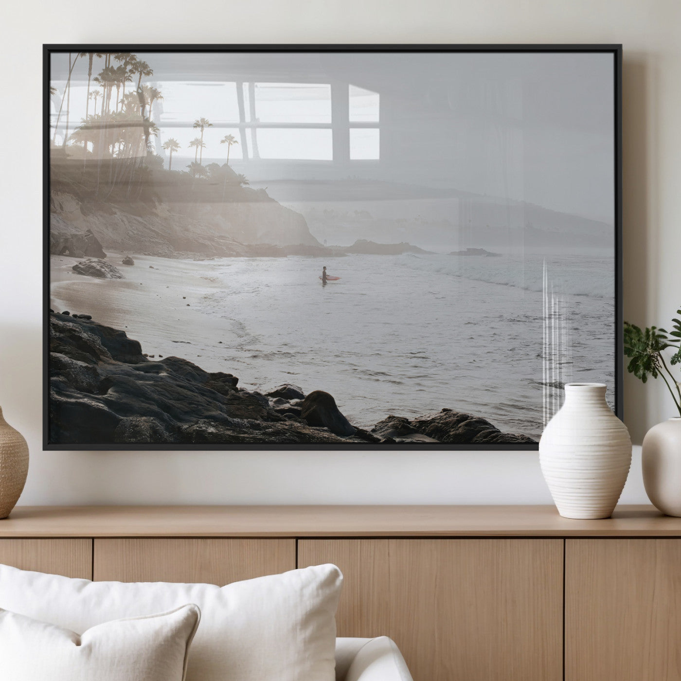 Framed canvas of a surfer in misty coastal tones at a foggy California beach, ideal for minimalist coastal beach or serene ocean-themed decor.