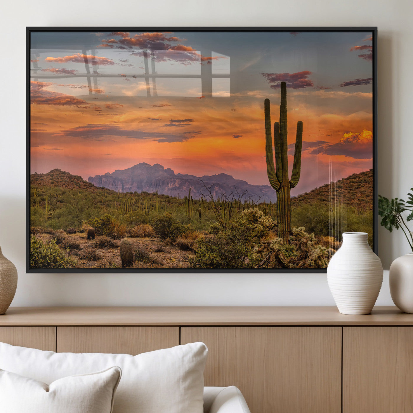 Vibrant desert sunset with saguaro cacti and distant mountains, perfect for Southwestern or warm-toned home decor.