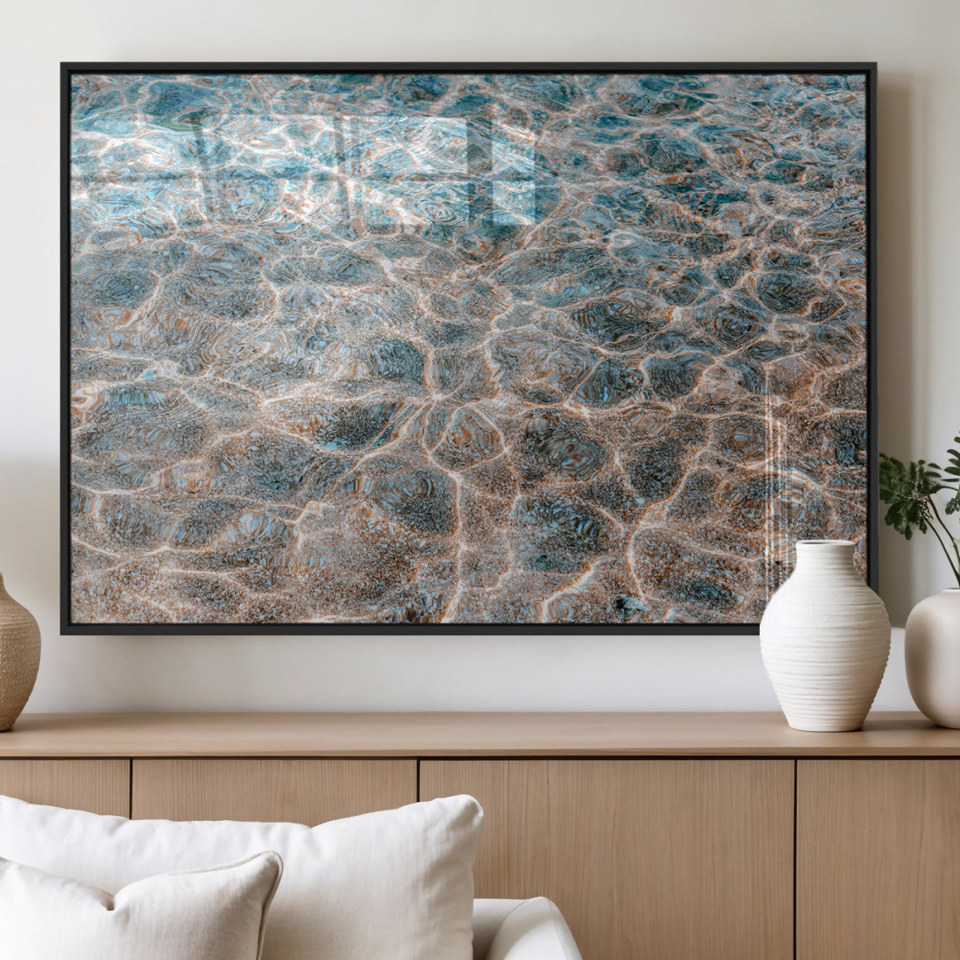 Close-up of sunlit ocean ripples with aqua blue and golden tones, ideal for modern coastal or minimalist home decor.