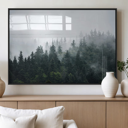 A misty evergreen forest shrouded in soft fog, creating a tranquil and moody landscape with lush green trees fading into the distance.