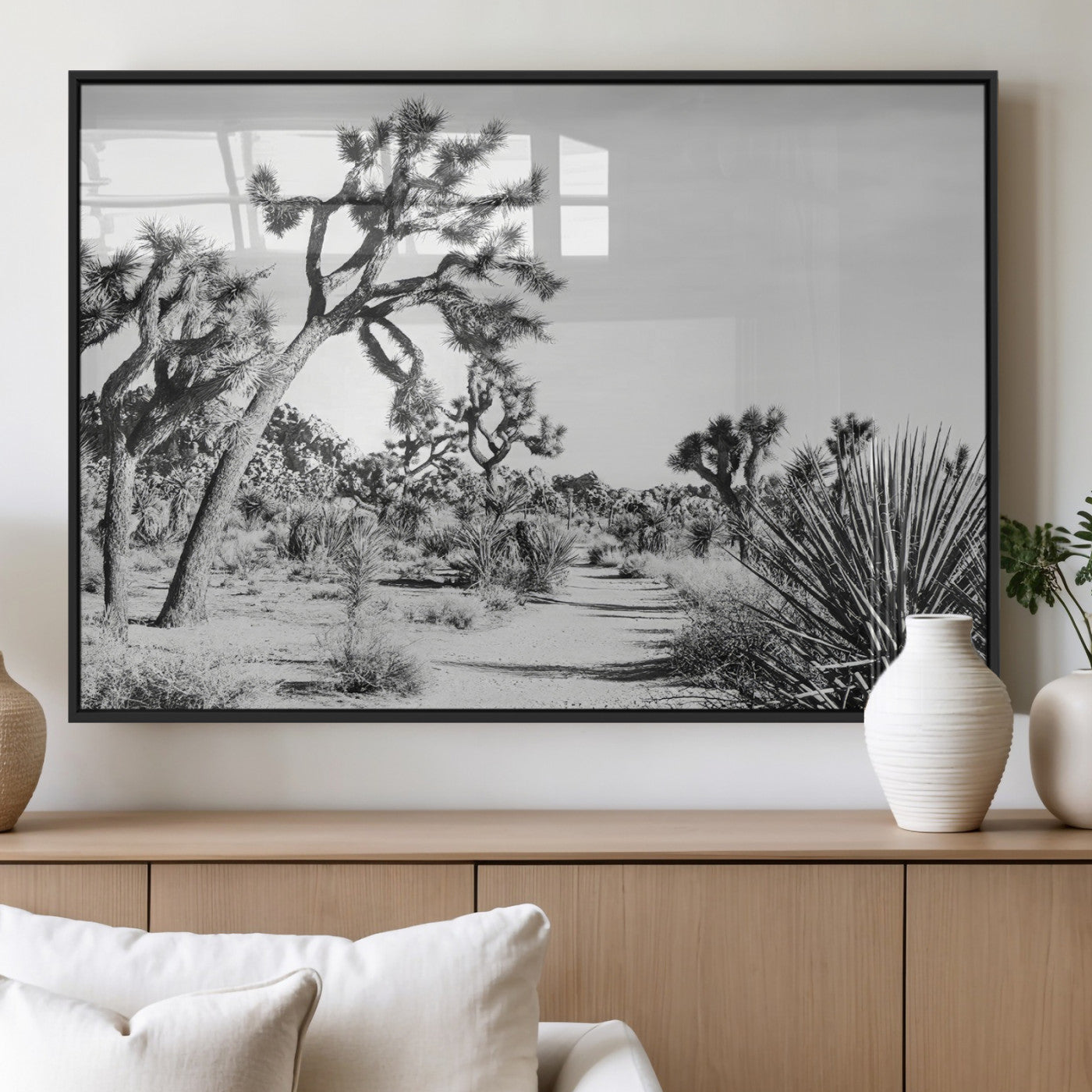 Canvas of a Joshua Tree forest in black and white tones, featuring a desert path and spiky vegetation, ideal for minimalist or rustic decor.